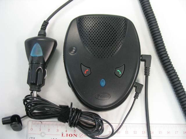 Wireless Handsfree car kit for mobile phones - FCC ID RRSPNG4 - Canhold International Ltd.