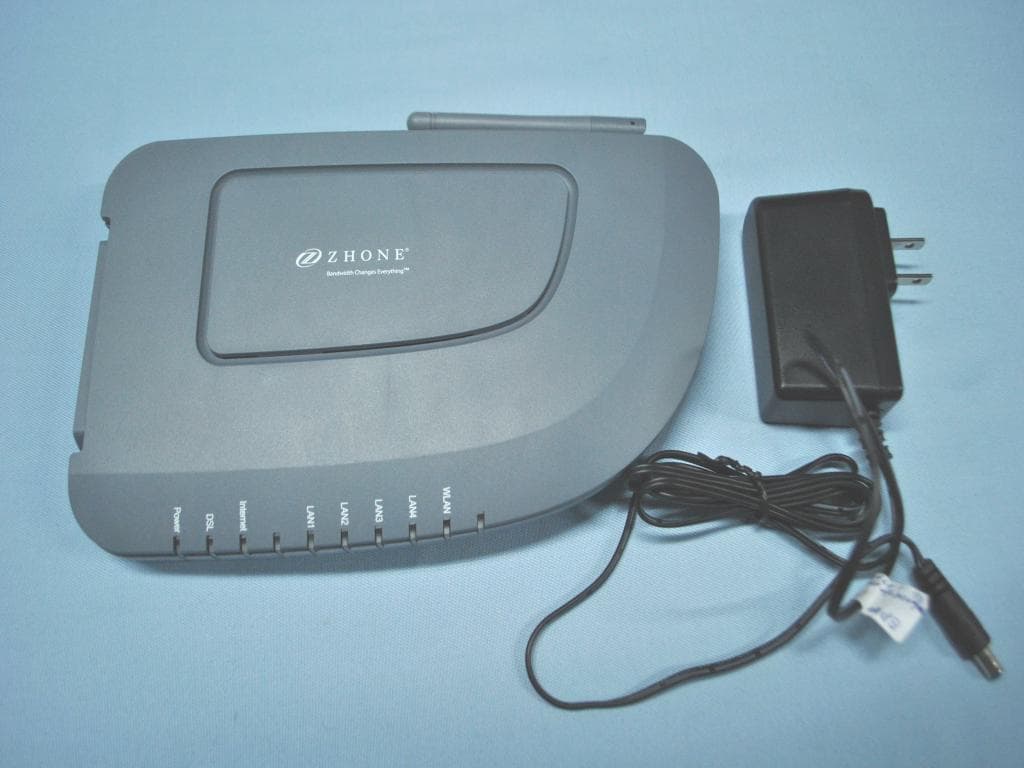 4 PORT WIRELESS B/G ADSL2+ MODEM ROUTER - FCC ID RS36518AX - Shanghai DareGlobal Technologies Co., Ltd. (2)