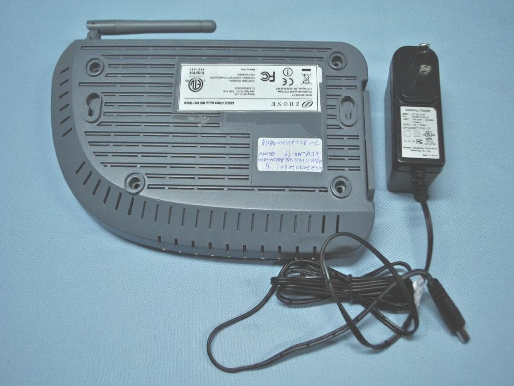 4 PORT WIRELESS B/G ADSL2+ MODEM ROUTER - FCC ID RS36518AX - Shanghai DareGlobal Technologies Co., Ltd.