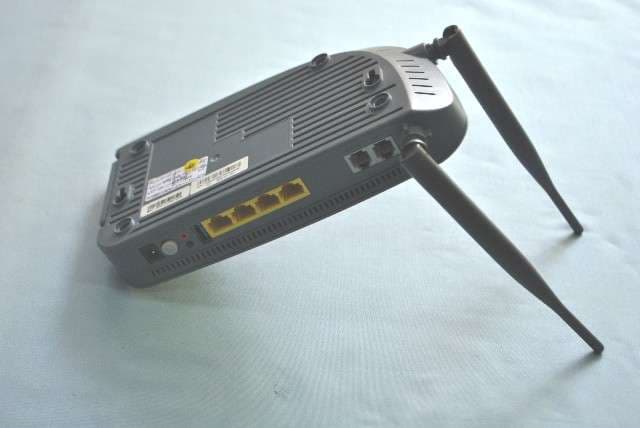 ADSL2+ 4 Port Router WIFI 802.11B/G/N 2X2 - FCC ID RS36519A1A2 - Shanghai DareGlobal Technologies Co., Ltd. (4)