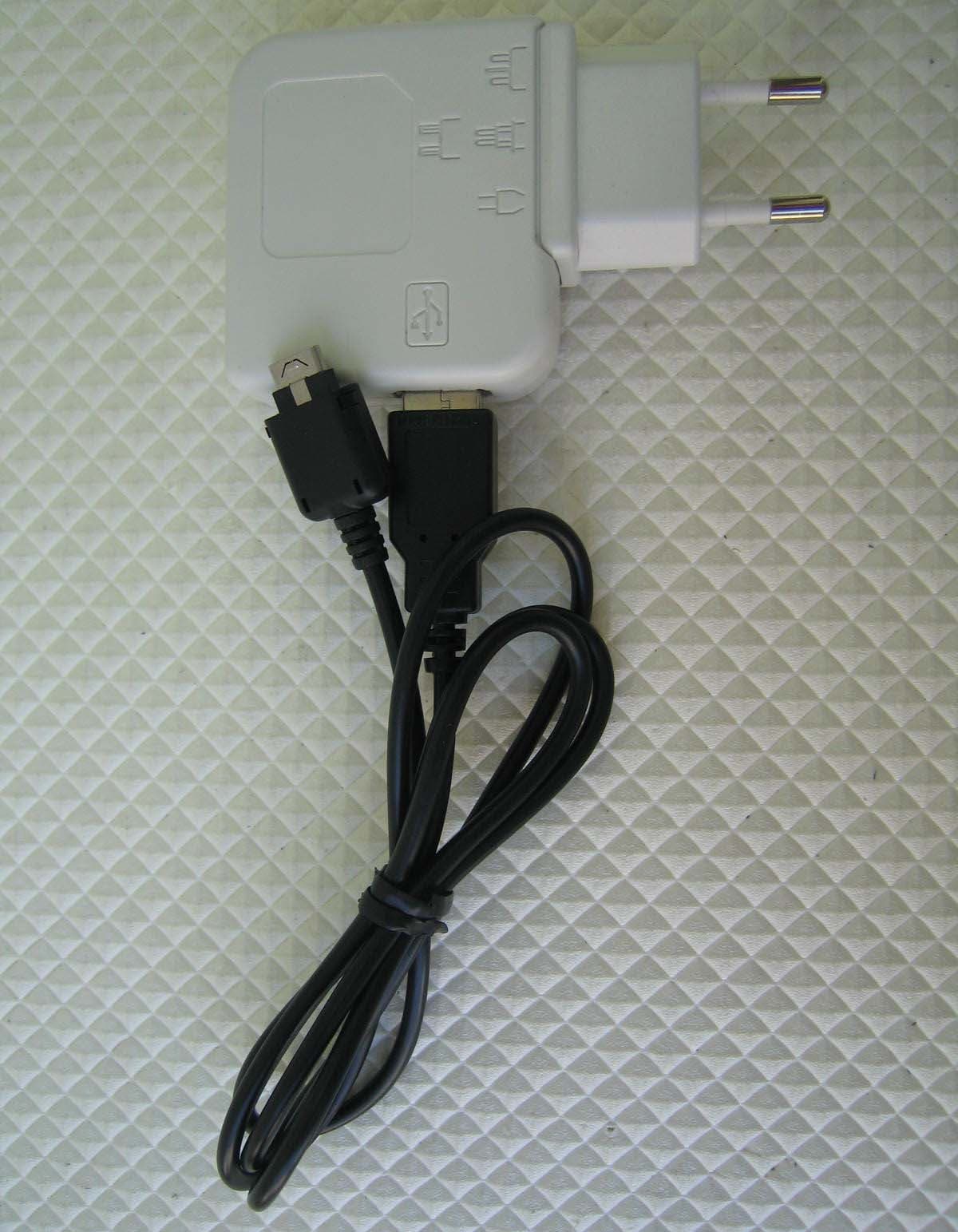 Tri Band GSM 850/1800/1900 Mobile Phone with BT - FCC ID RV2SLT100 - Ezze Mobile Tech., Inc.