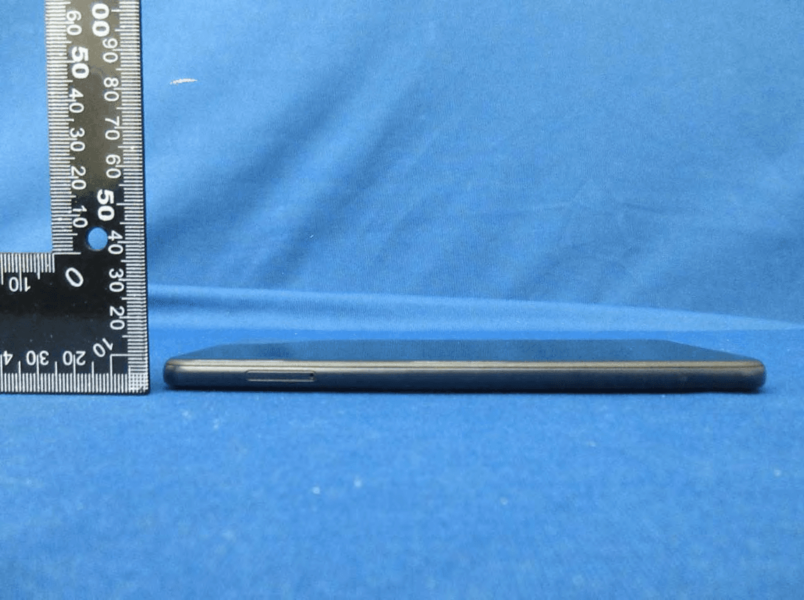 WCDMA/LTE Mobile Phone - FCC ID RYQEA211002 - FIH CO., LTD. (5)
