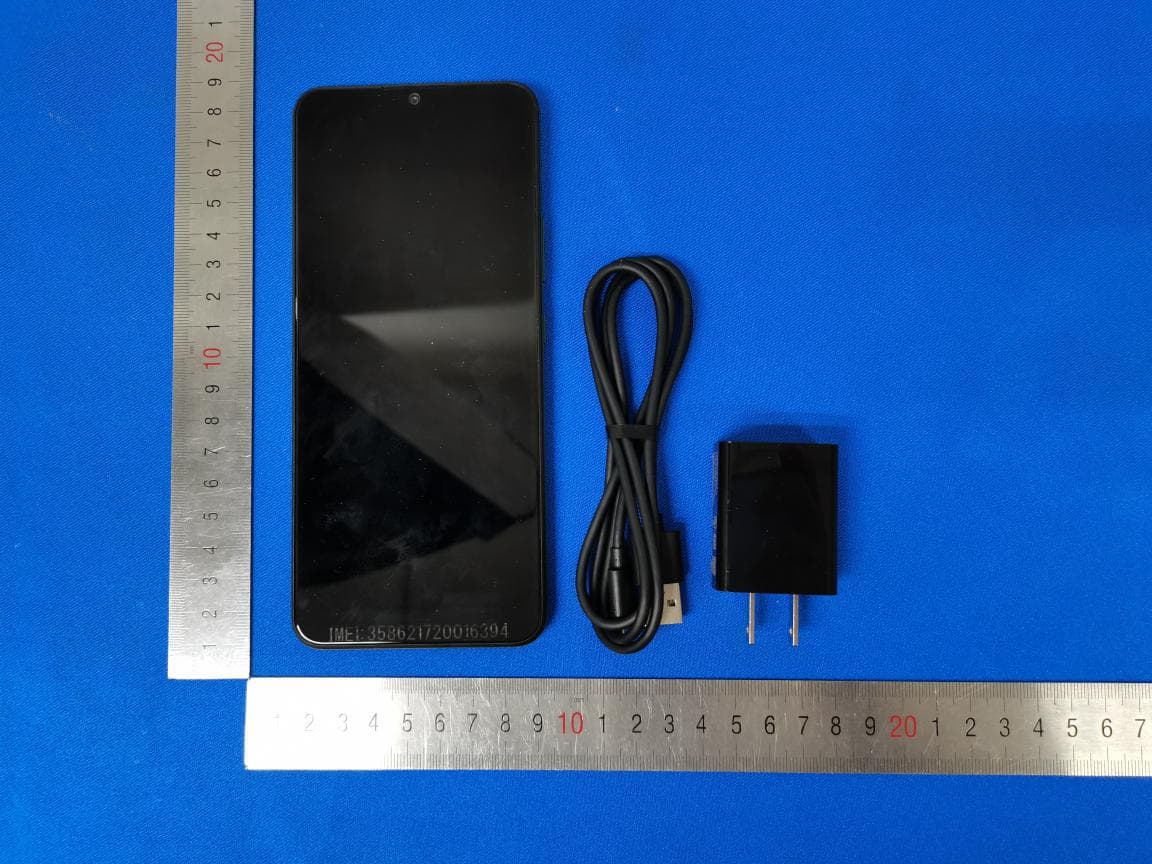 WCDMA/LTE Mobile Phone - FCC ID RYQEC1002 - FIH CO., LTD. (2)