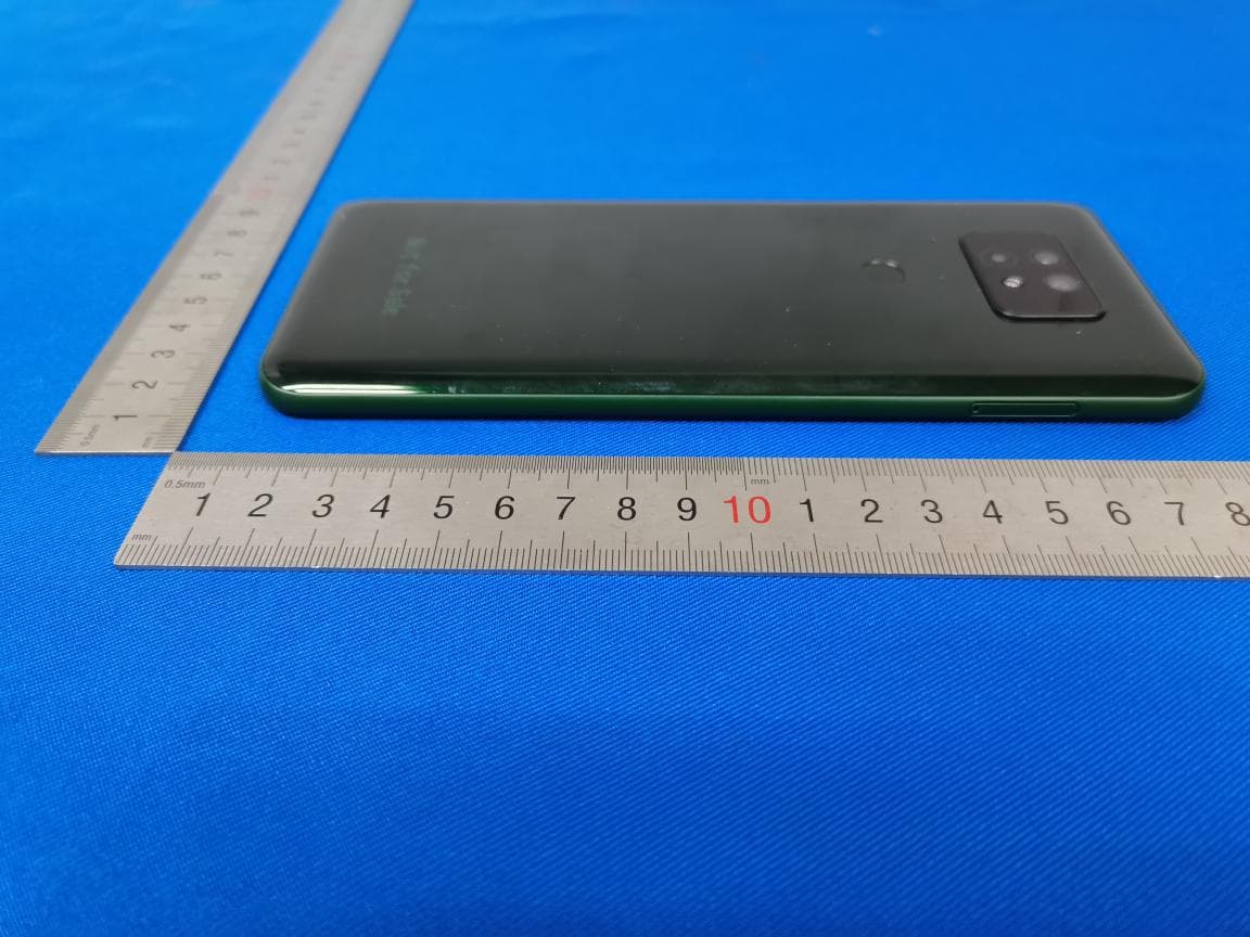 WCDMA/LTE Mobile Phone - FCC ID RYQEC1002 - FIH CO., LTD. (4)