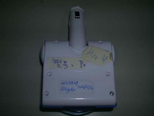 FM Transmitter with Auto Power Adapter - FCC ID S4CKC9512 - Alligator Game Company Limited (2)