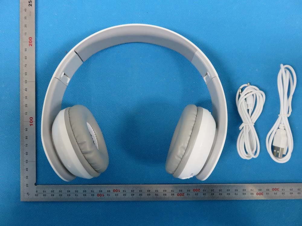 Bluetooth headphone - FCC ID S7DBH-30 - MAGIT International Co., Ltd