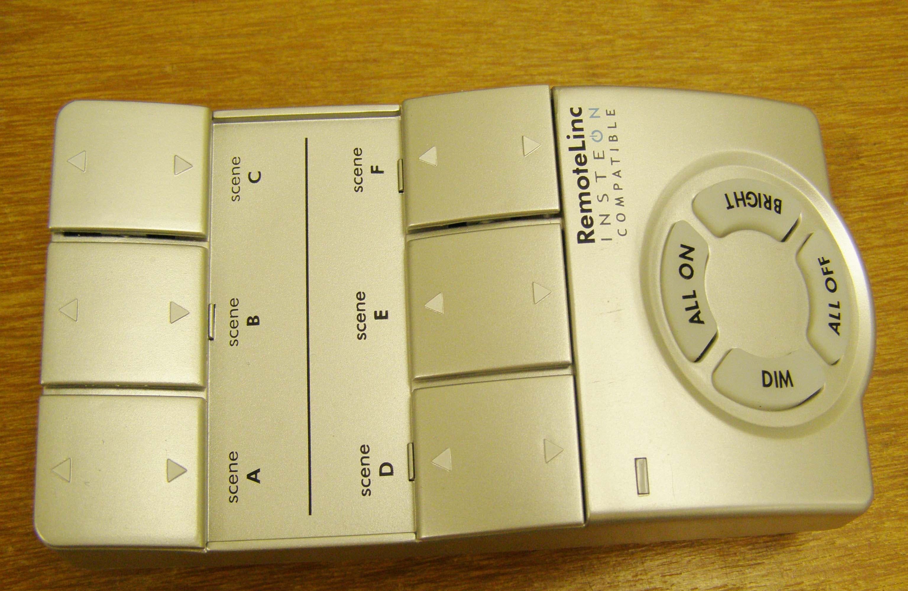 Handheld Wireless Remote Control (Model: 2440) - FCC ID SBP2440A - Insteon Technologies, LLC