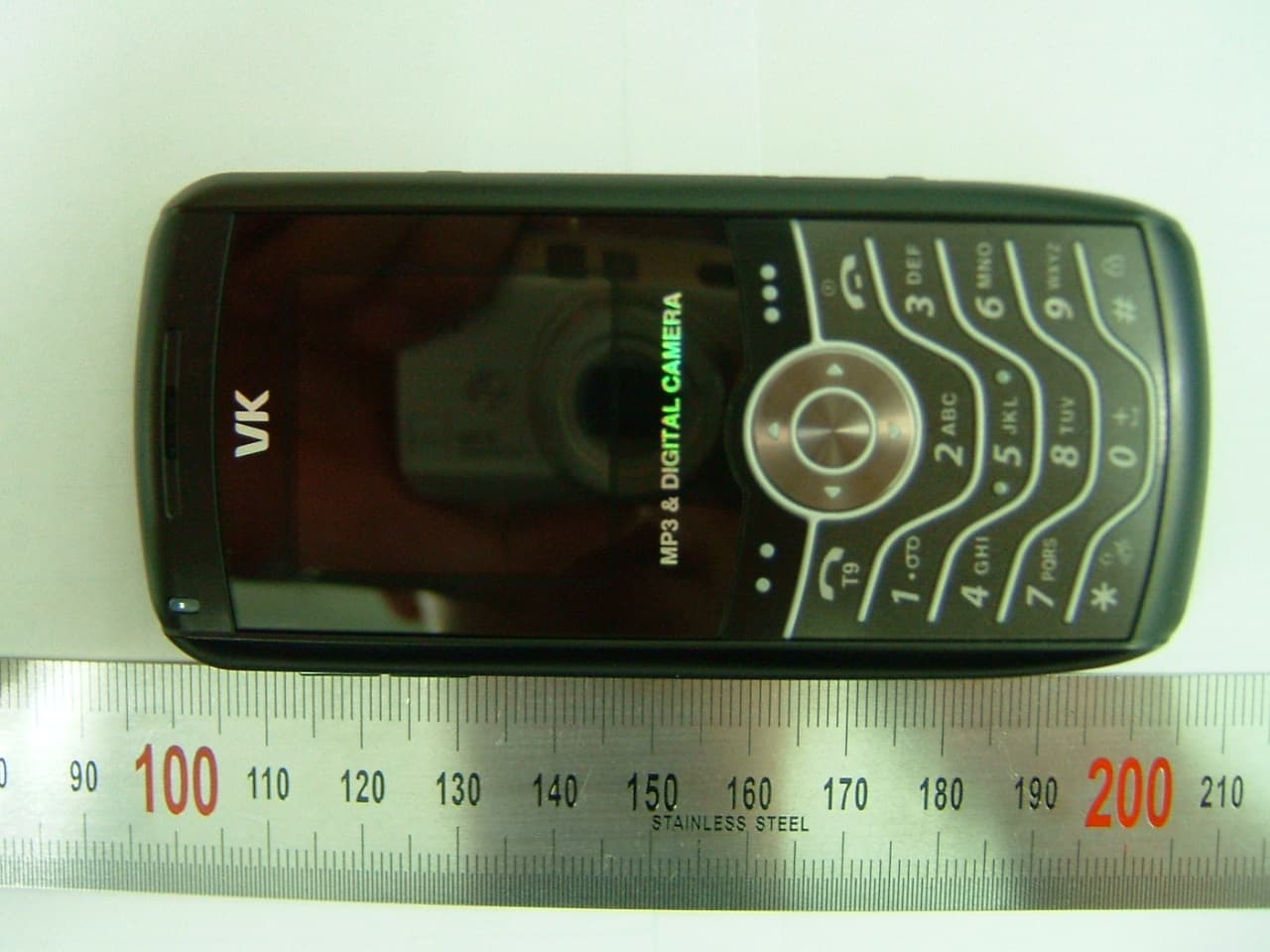 QUAD-BAND GSM PHONE - FCC ID SBWVK200 - VK Corporation