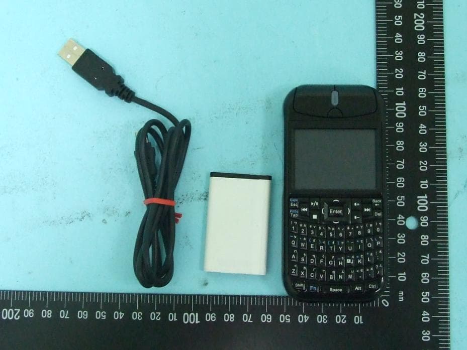 2.4 GHz Wireless Keyboard Mouse - FCC ID SH6KM1000 - Raytac Corp. (4)