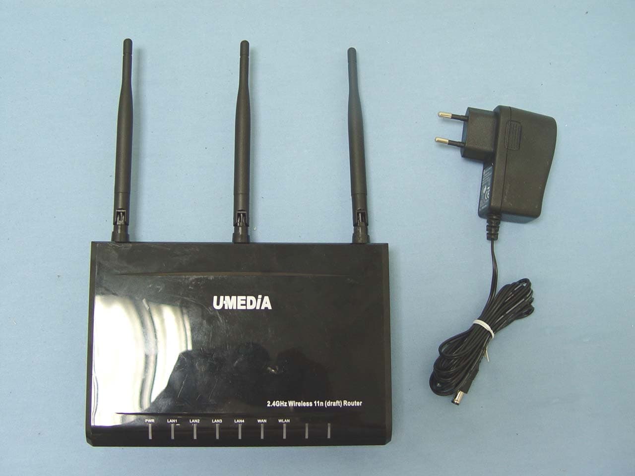 2.4GHz 11n Draft 2.0 1+4 Port WLAN Router - FCC ID SI5WRT383U - U-MEDIA Communications, Inc.