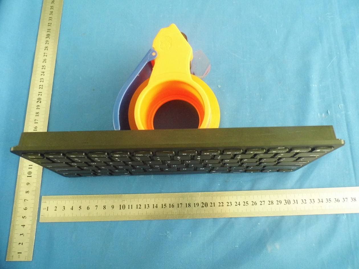 Bluetooth Keyboard - FCC ID SJ6BKB018 - Shenzhen Weijian Plastics Co., Ltd. (2)