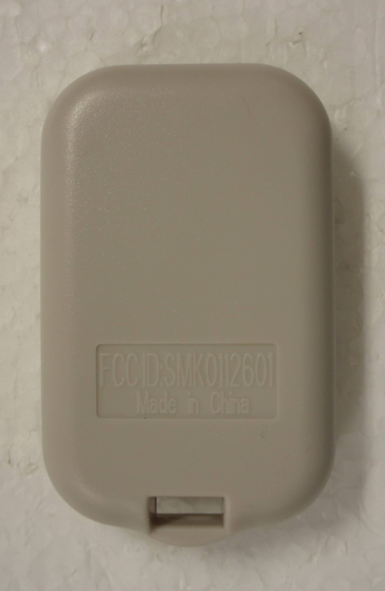 REMOTE CONTROL TRANSMITTER - FCC ID SMK0112601A - Mr. Butler Company