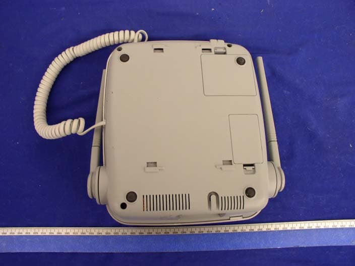 Dual Mode GSM850/1900 & 2.4 GHz FHSS Cordless Ph - FCC ID SNBDM1000 - Waxess Inc. (4)
