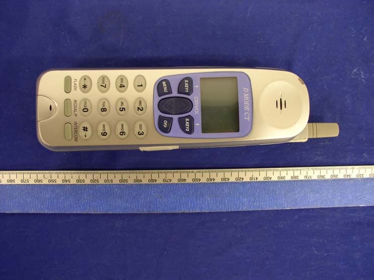 Dual Mode CDMA 850/1900 MHz & 2.4GHz FHSS Phone - FCC ID SNBDM100HS - Waxess Inc.