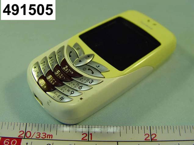 TRI-BAND GPRS MOBILE PHONE - FCC ID SNFG01 - Asmobile Communication Inc. (4)