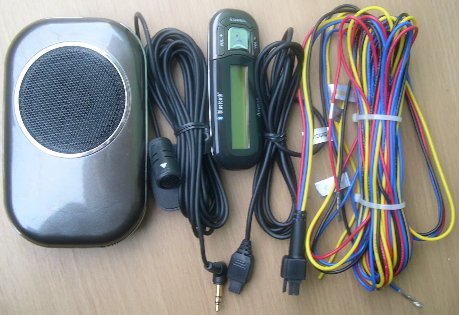 Bluetooth Handsfree Carkit - FCC ID SPXHKT100BDE - Youngbo Engineering Inc.