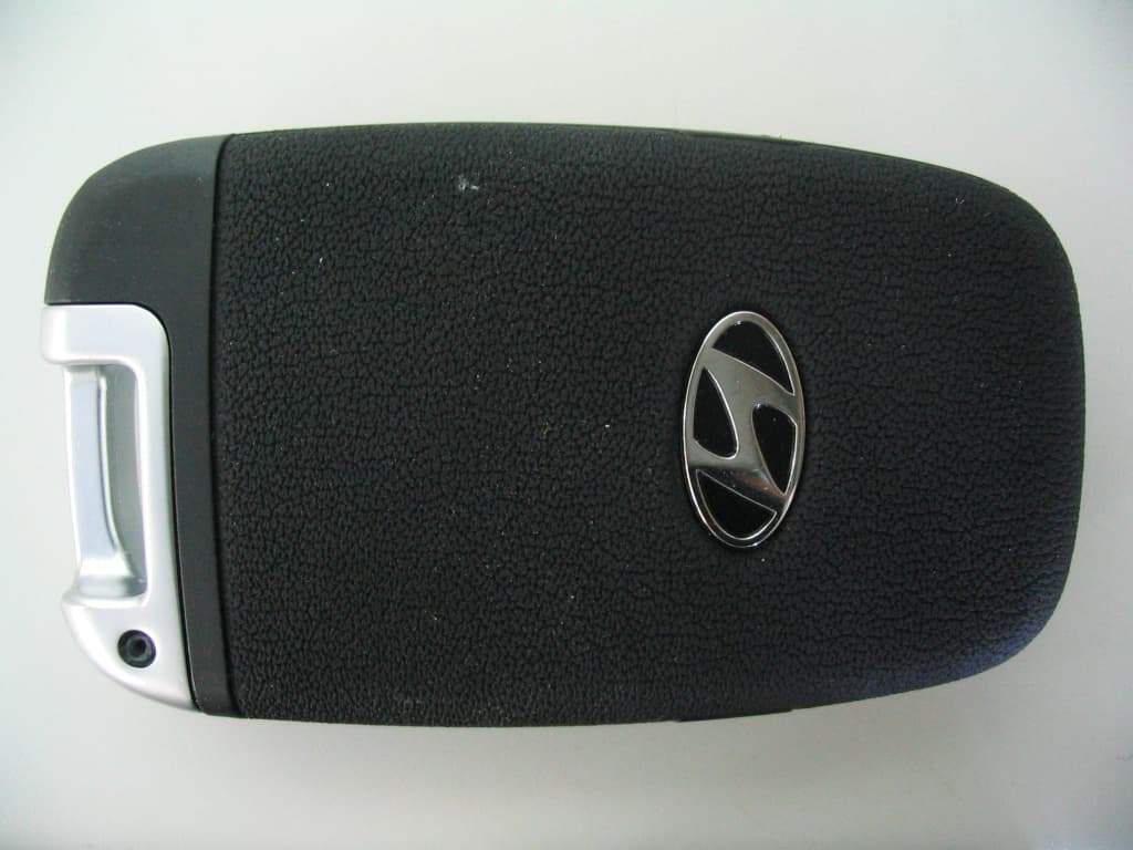 Smart key Fob - FCC ID SY5BH4FNA04 - Continental Automotive Korea Ltd.