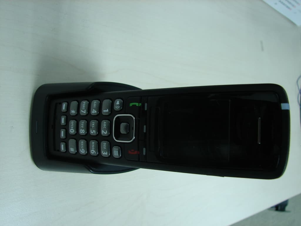 DECT 6.0 Handset - FCC ID T7HCT8660 - RTX Hong Kong Ltd. (1)