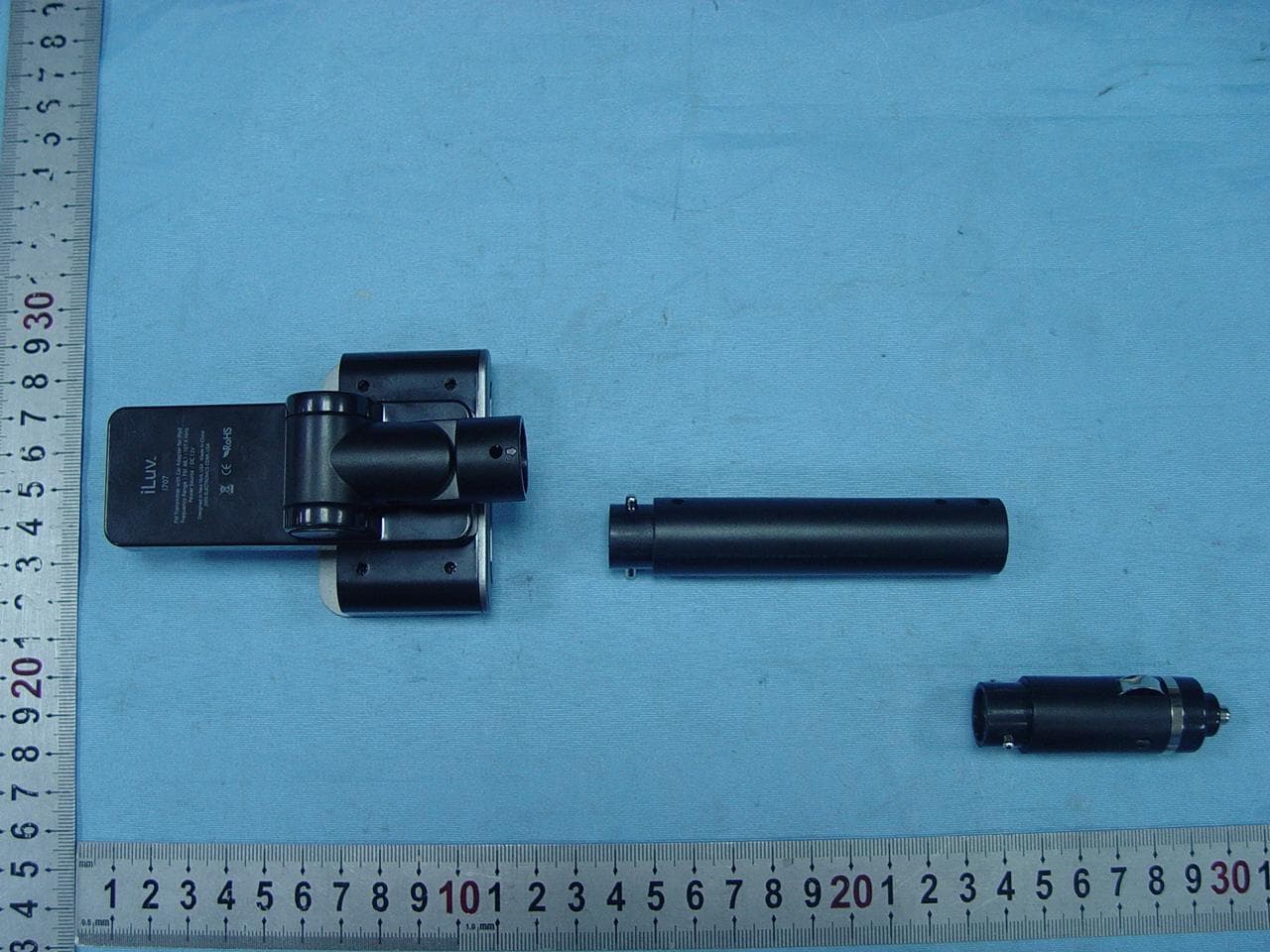 FM Transmitter with Car Adapter for iPod - FCC ID TM4I707 - Teleway Industrial Ltd