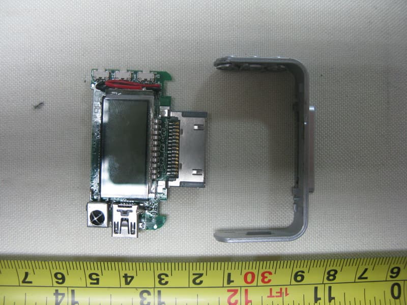 Portable FM Transmitter which model name FMPort - FCC ID TQN0910RF12 - Power 7 Technology Corp. (3)