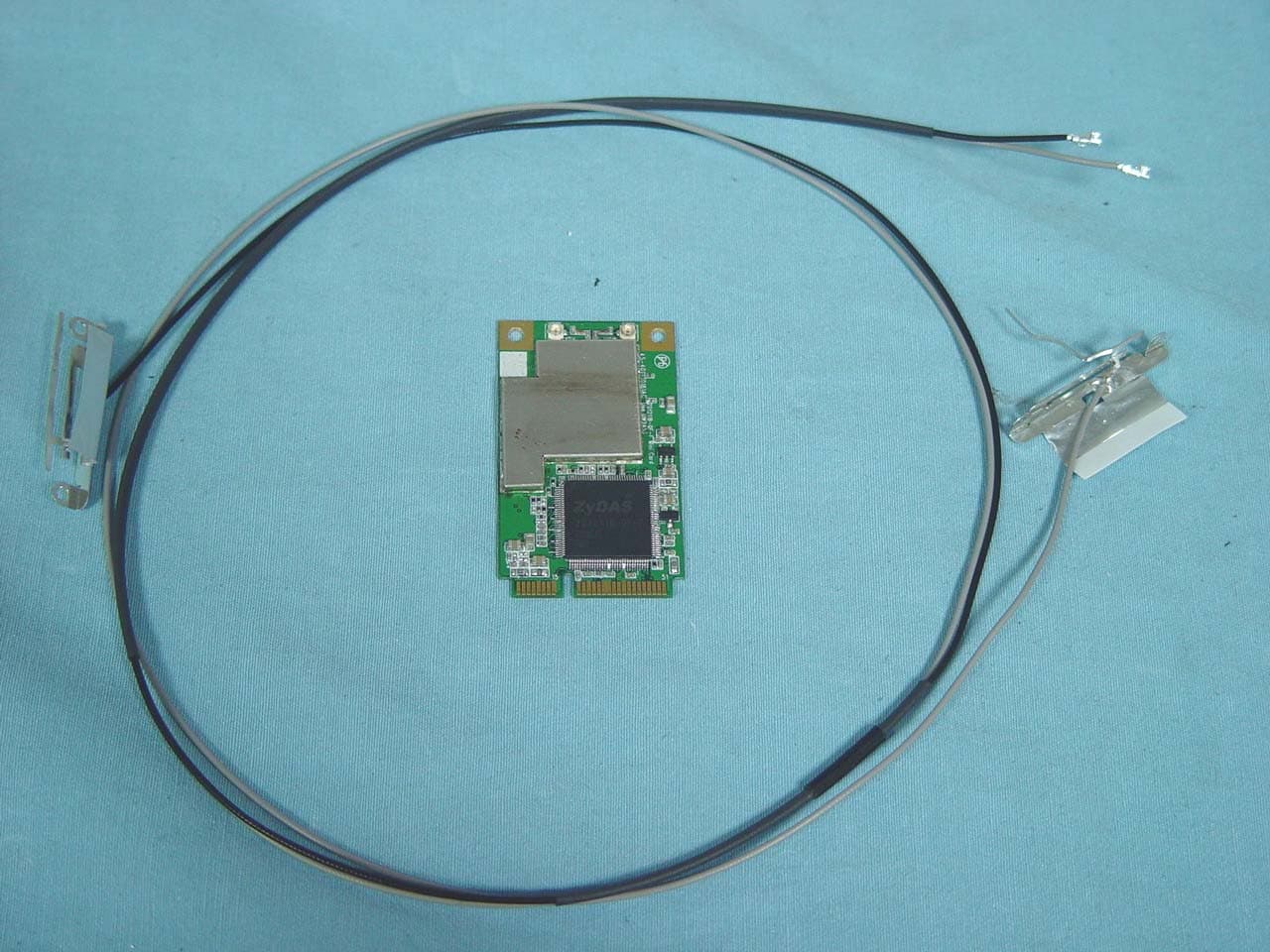 IEEE 802.11 b+g mini Card - FCC ID TXG-ZD1211B-QF-F - ZyDAS Technology Corporation
