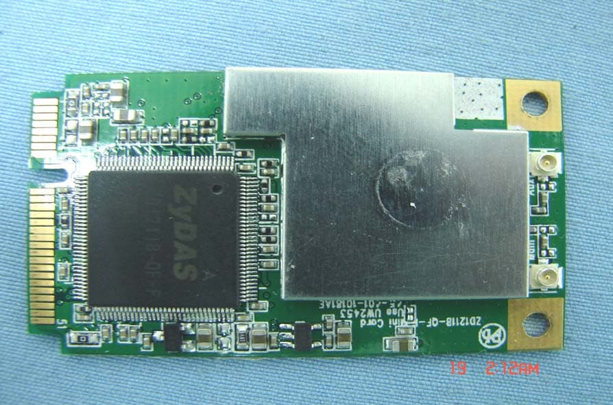 IEEE 802.11b+g Mini Card - FCC ID TXG-ZD1211B-QF-F2 - ZyDAS Technology Corporation (2)
