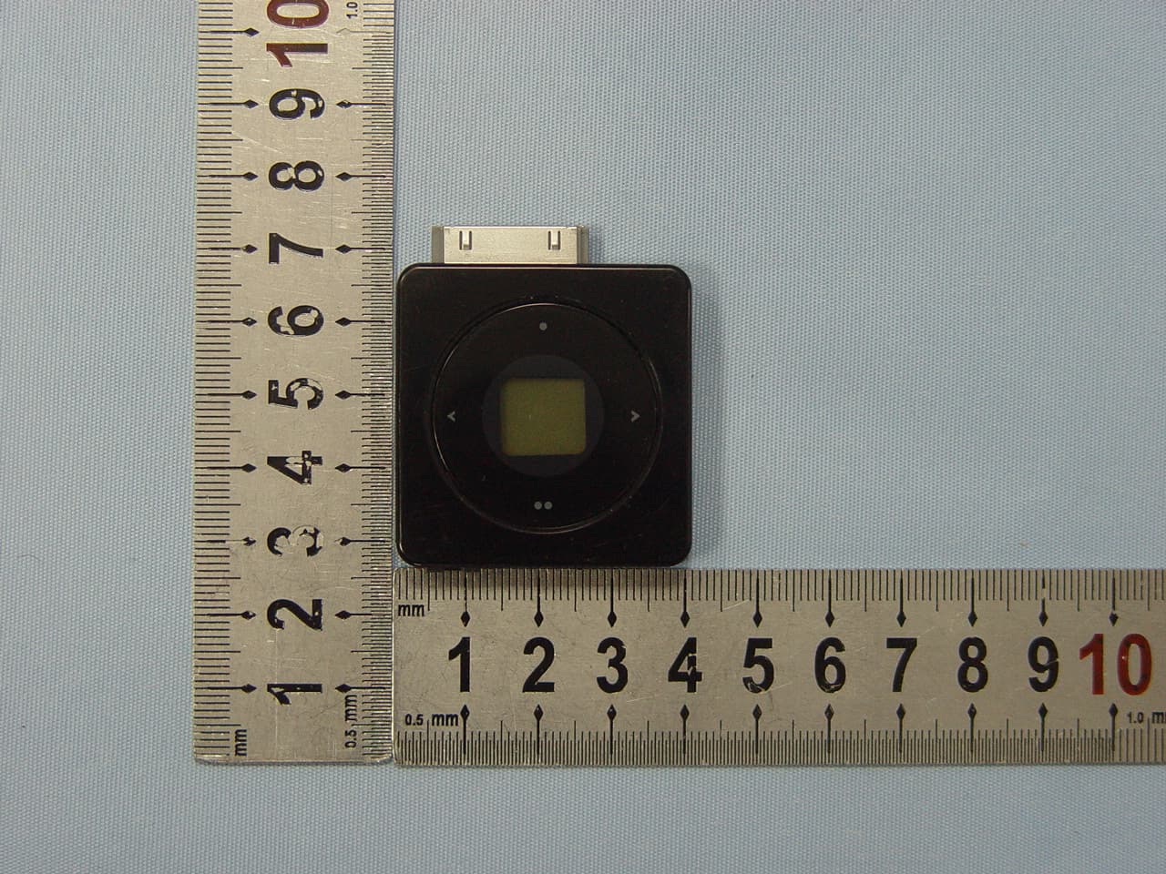 FM Transmitter For iPod - FCC ID TZ9I703 - Seatune Electronics Co., Ltd
