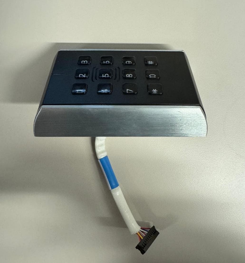 Aperio V3 IN100 Keypad Variant RF Module - FCC ID U4A-SCYMCA1K - ASSA ABLOY Inc.