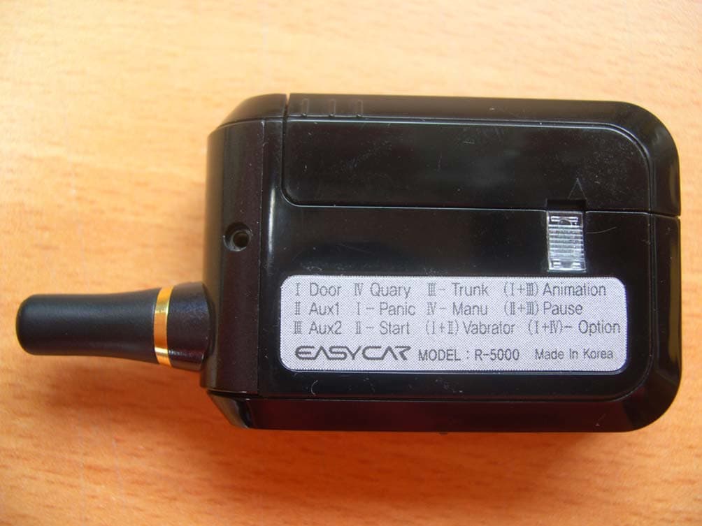 CAR ALARM SYSTEM - FCC ID UGI-R5000 - EZ Telematics