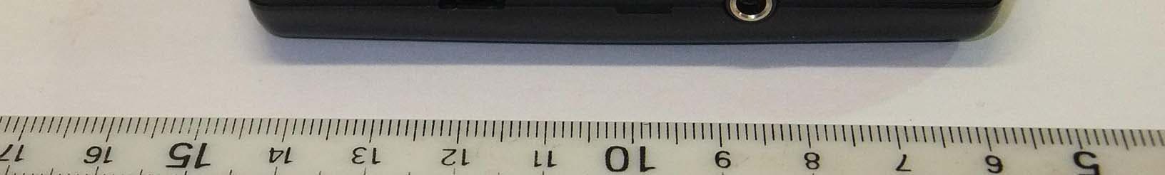 Wireless communication accessory for hearing aids - FCC ID VFC132001 - Etratech Inc. (3)