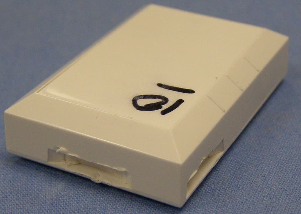 Wireless door/window contact with local bypass - FCC ID WDQ-DW40345 - Nortek Security & Control LLC/2GIG