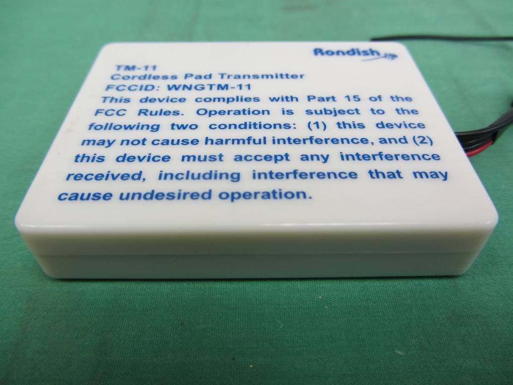 Cordless Pad Transmitter - FCC ID WNGTM-11 - RONDISH CO. LTD