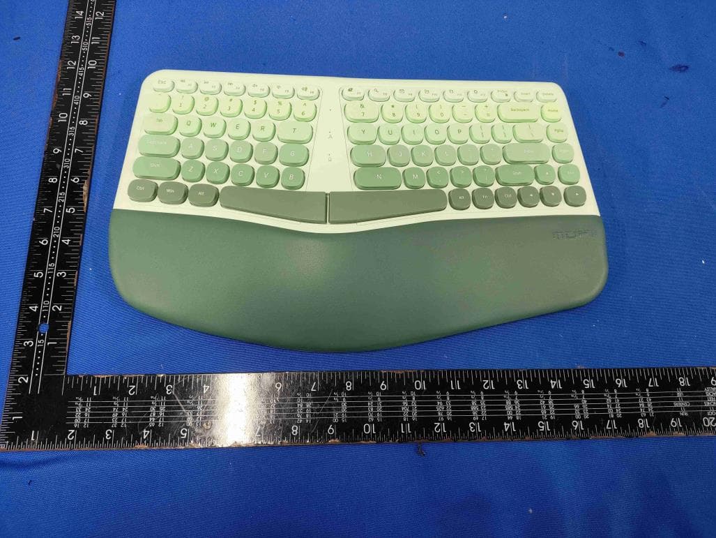 Ergonomic wireless keyboard and mouse set --- Keyboard - FCC ID WOX-SK-707AG - Shenzhen SQT Electronics Co., Ltd.