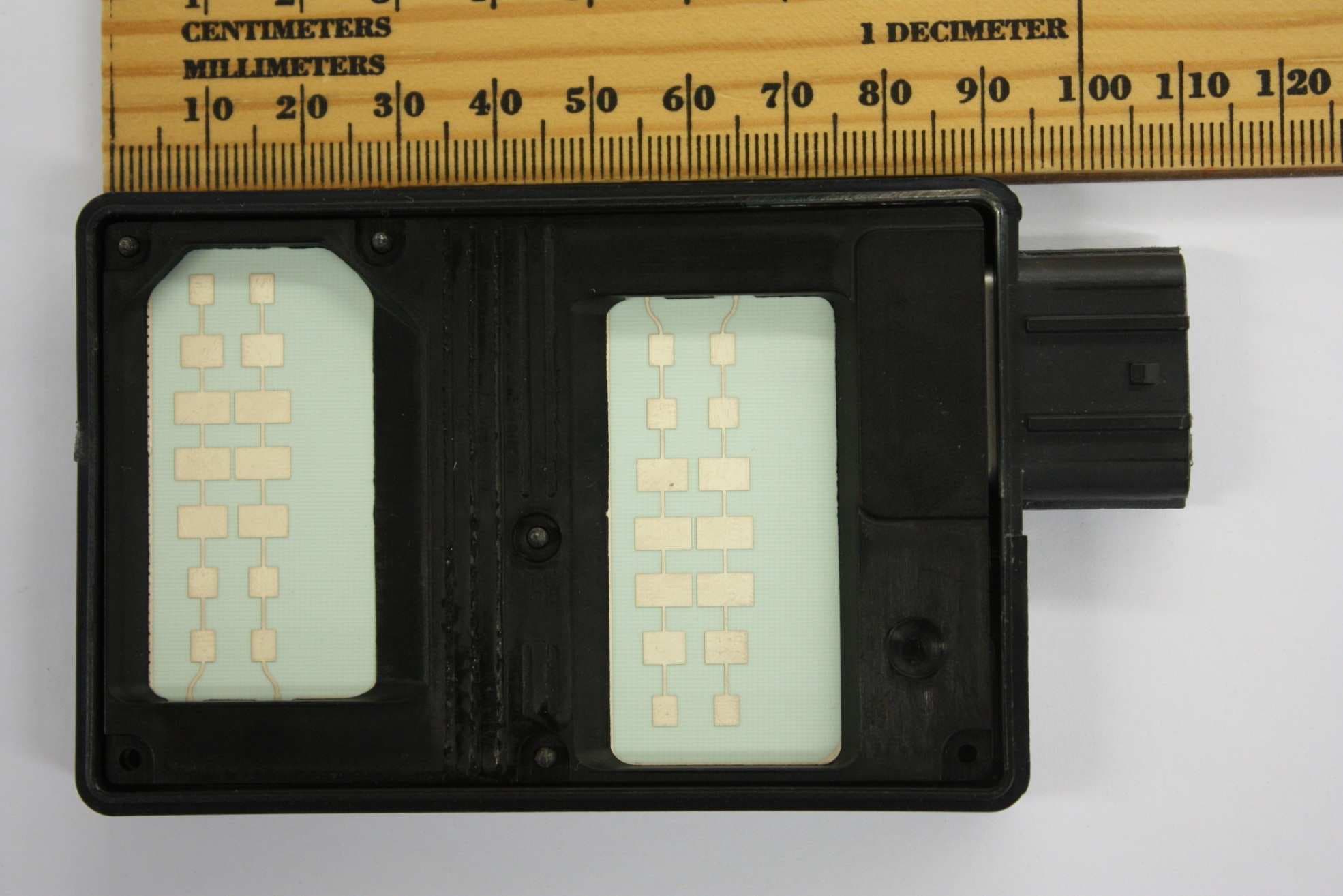 VEHICLE RADAR SENSOR, REAR CROSS TRAFFIC ALERT - FCC ID WU8NB24BS - Magna Electronics, LLC (2)