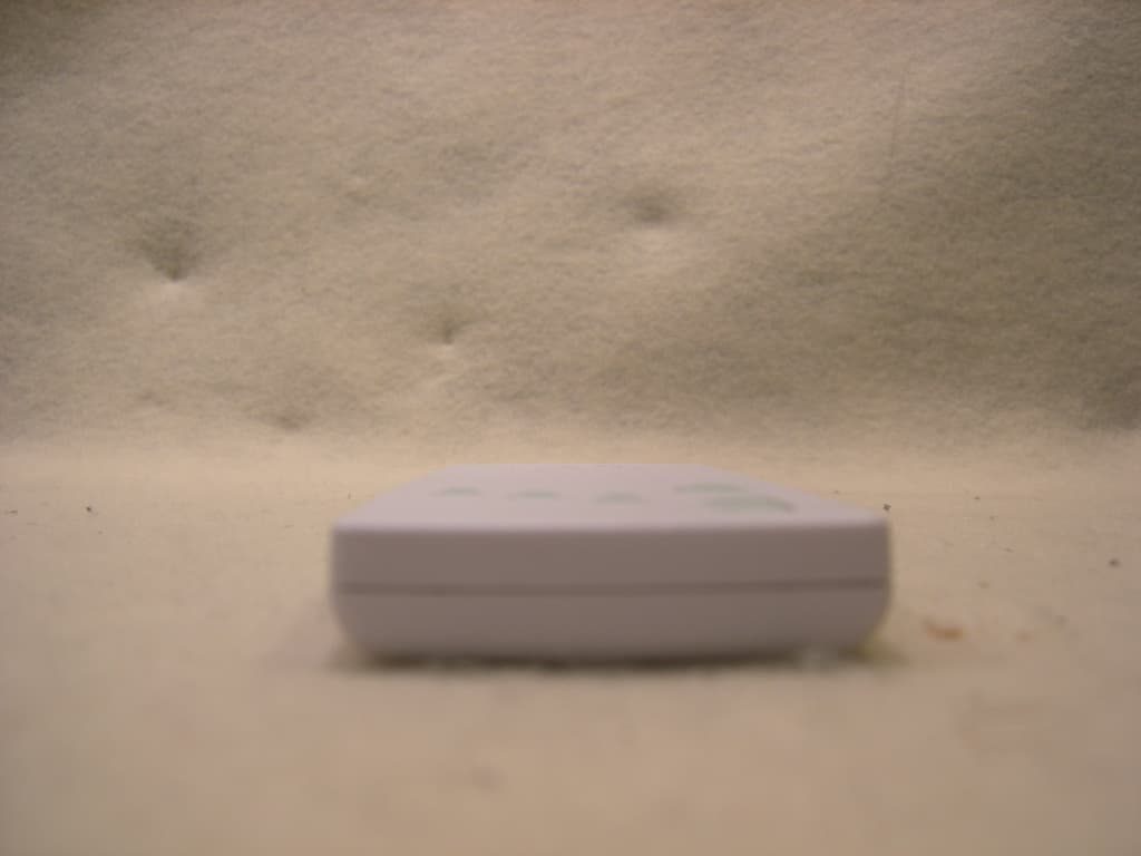 E-SHADE HANDHELD TRANSMITTER - FCC ID X6P-0003186B - The Watt Stopper Inc., d/b/a Qmotion (4)