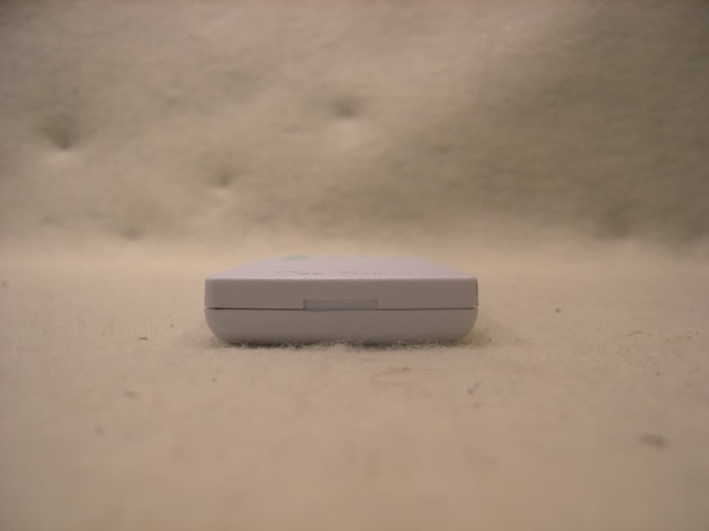 E-SHADE HANDHELD TRANSMITTER - FCC ID X6P-0003186B - The Watt Stopper Inc., d/b/a Qmotion (5)