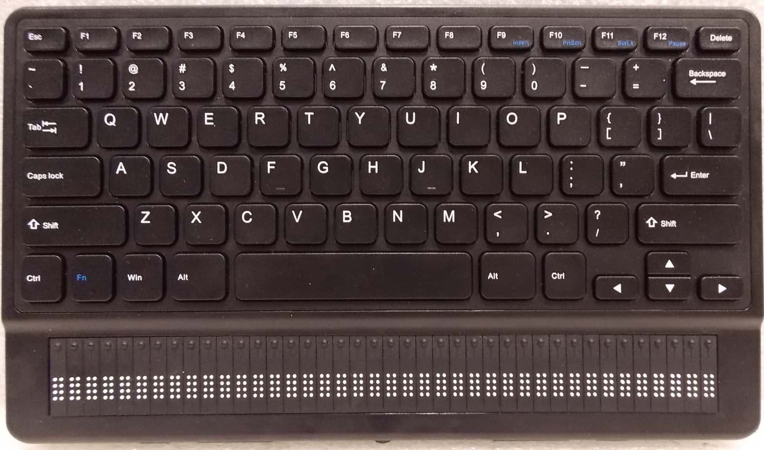 braille notetaker and book reader - FCC ID XT5-BRQT40 - Technologies Humanware Inc.