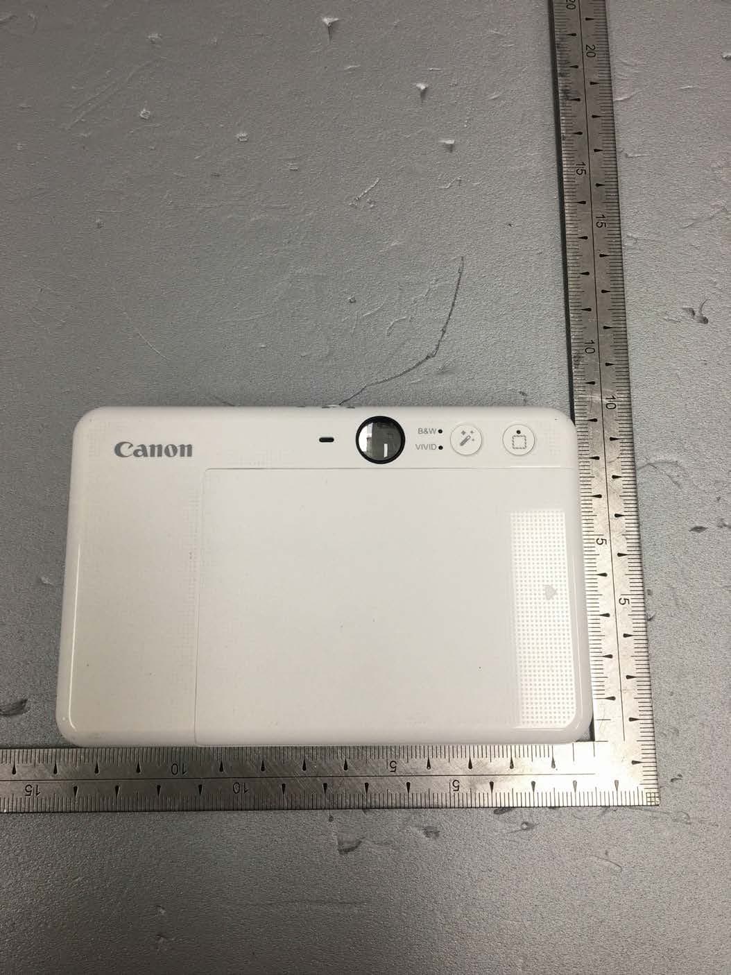 Instant Camera Printer - FCC ID Y7J-PP2002 - Canon Electronic Business Machines (H.K.) Co., Ltd.