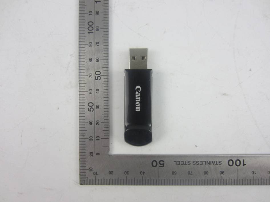 2.4G wireless presenter (dongle) - FCC ID Y7J-PR100RR - Canon Electronic Business Machines (H.K.) Co., Ltd.