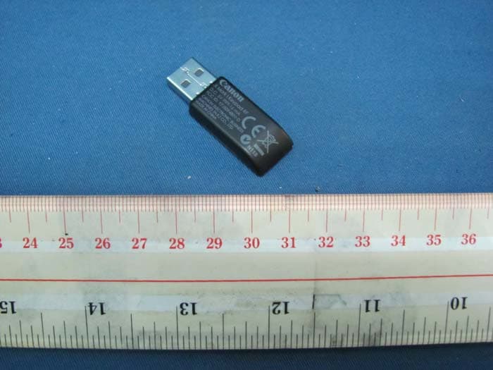 Keypad RF with Calculator (Dongle) - FCC ID Y7J5094B01-D - Canon Electronic Business Machines (H.K.) Co., Ltd.