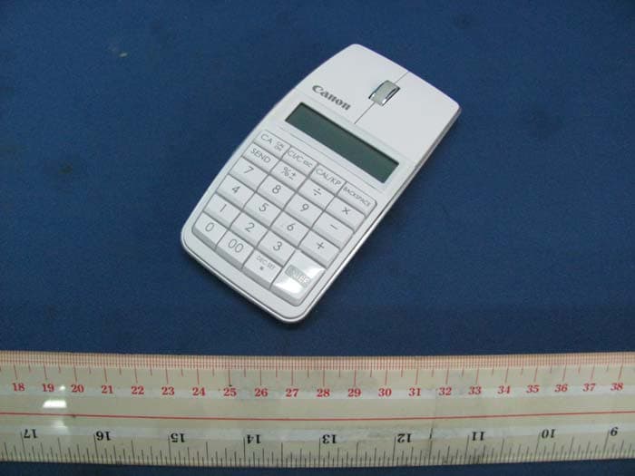 Bluetooth Wireless Mouse with Calculator - FCC ID Y7J5565B01 - Canon Electronic Business Machines (H.K.) Co., Ltd.