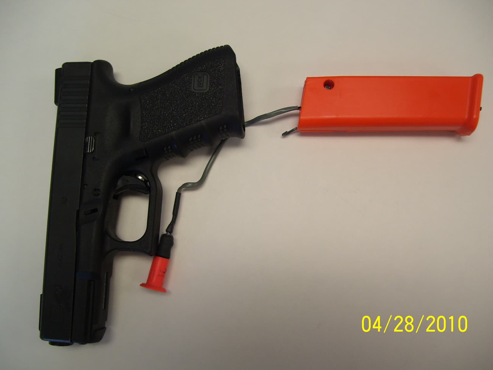WIRELESS GUN TRIGGER / MAGAZINE DEVICE - FCC ID YCYRSMGZ1 - Novel Engineering Rapid Design Services, Inc. (1)