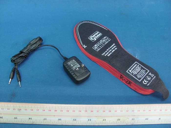 Heated Insoles With Rechargeable Batteries - FCC ID YGU-TS03S - Reinbacher International Limited