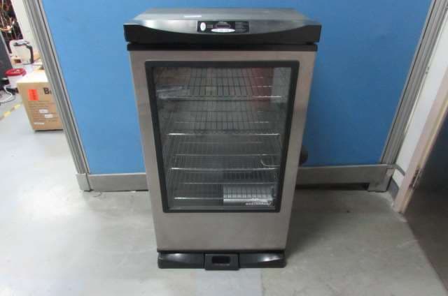 30 and 40 inch Electric Smoker with Bluetooth - FCC ID YHXESQ-3040C5 - Masterbuilt Manufacturing, LLC.