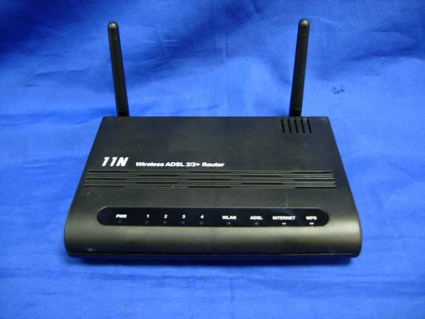 Wireless 802.11n 4 Ports ADSL2/2+ Router - FCC ID YHYPTI-8511N - Paradigm Technology, Inc. (2)