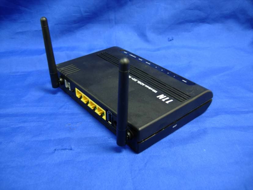Wireless 802.11n 4 Ports ADSL2/2+ Router - FCC ID YHYPTI-8511N - Paradigm Technology, Inc. (3)