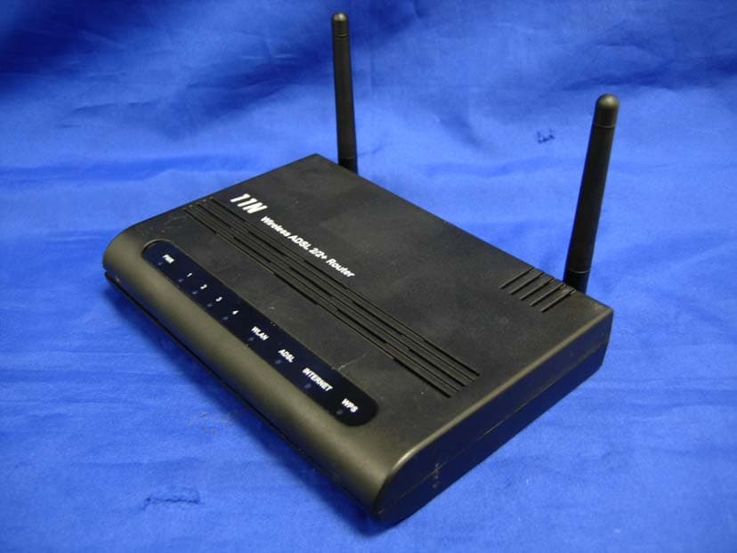 Wireless 802.11n 4 Ports ADSL2/2+ Router - FCC ID YHYPTI-8511N - Paradigm Technology, Inc.