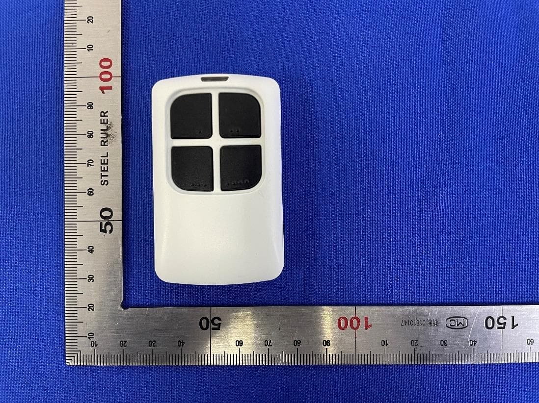 Remote Control for Garage Door Opener - FCC ID YJFUTX - GUARDIAN SHANGHAI CORP.