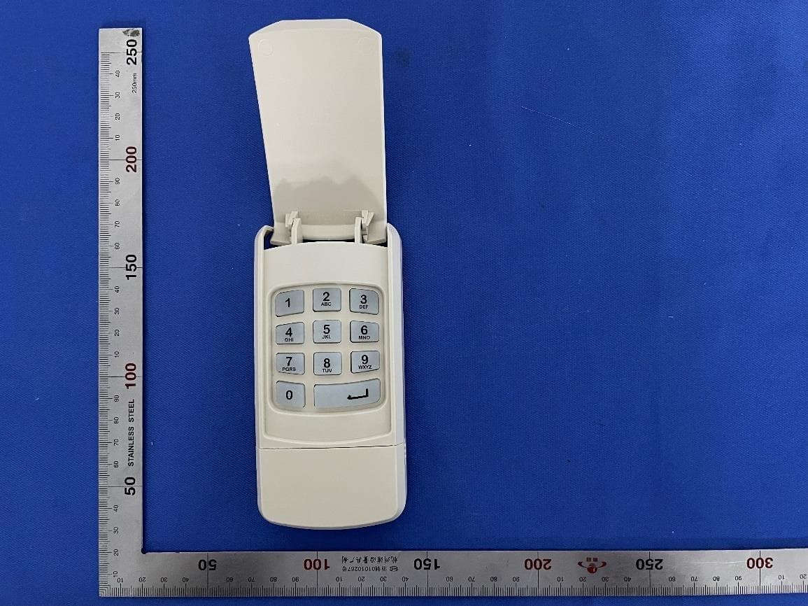 Wireless Keyless Entry Pad for Garage Door Opener - FCC ID YJFWK303 - GUARDIAN SHANGHAI CORP.