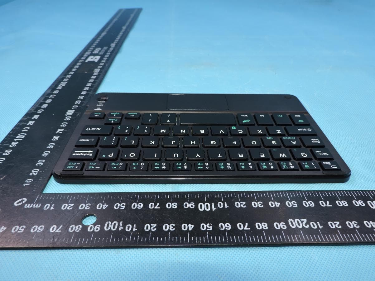 Universal Folio Bluetooth Keyboard - FCC ID YJW-06335 - Superior communications . (5)
